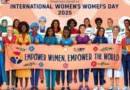 "Women from diverse backgrounds celebrating Women's Day 2025, standing united with a banner reading 'Empower Women, Empower the World,' symbolizing gender equality, strength, and unity महिला दिवस